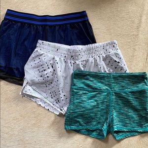 Fabletics Black Netted Shorts with Blue Spandex